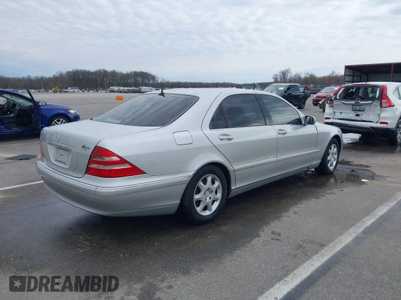 2000 Mercedes-Benz S-Class with VIN WDBNG70JXYA054073, listed as a IAAI auction lot 41987179 with 124,968 mi miles. Bid and sale history available at carsss.com. Image 4.