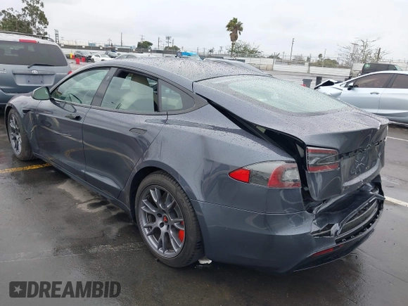 2022 Tesla Model S with VIN 5YJSA1E52NF459460, listed as a IAAI auction lot 41736236 with Not Provided miles and . Bid and sale history available at DreamBid. Image 3.