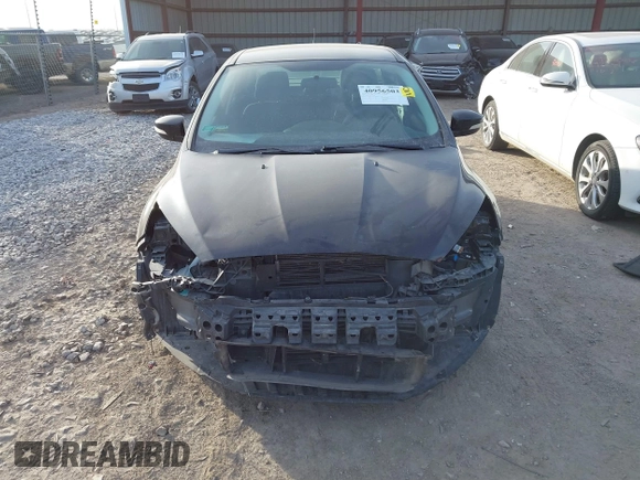 2016 Ford Focus SE z VIN 1FADP3FEXGL310270, wystawiony jako IAAI lot #40956503 z przebiegiem 156 812 mil mil oraz . Historia ofert i sprzedaży dostępna na DreamBid. Obrazek 13.