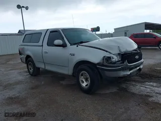 1999 Ford F-150 Work Series with VIN 1FTZF1728XKA70640, listed as a IAAI auction lot 39180269 with 1 mi miles. Bid and sale history available at carsss.com. Image 1.