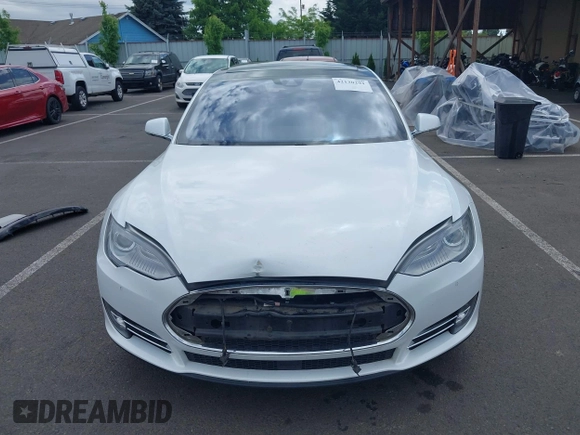 2016 Tesla Model S 90D with VIN 5YJSA1E21GF121962, listed as a IAAI auction lot 42130291 with 114,670 mi miles and . Bid and sale history available at DreamBid. Image 13.