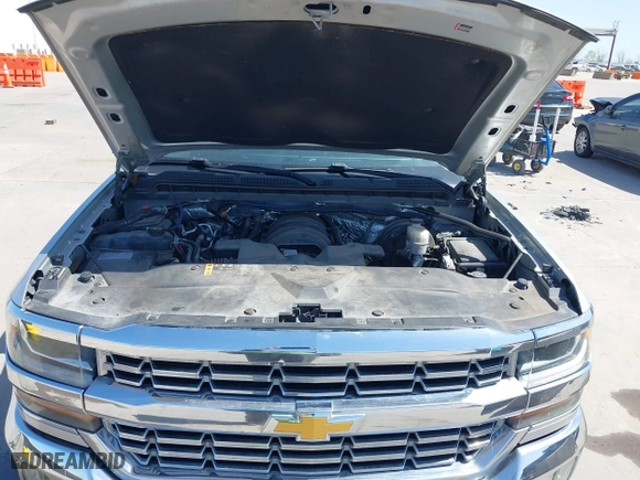 2018 Chevrolet Silverado 1500 LT with VIN 3GCPCRECXJG159263, listed as a IAAI auction lot 41856210 with 184,020 mi miles. Bid and sale history available at carsss.com. Image 10.