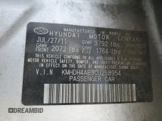 2012 Hyundai Elantra GLS z VIN KMHDH4AE3CU258954, wystawiony jako Copart lot #57435455 z przebiegiem 177 657 mil mil oraz Szkoda całkowita • Salvage title. Historia ofert i sprzedaży dostępna na DreamBid. Obrazek 12.