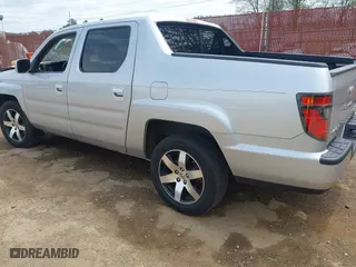 2014 Honda Ridgeline SE with VIN 5FPYK1F62EB013329, listed as a IAAI auction lot 41876728 with 127,014 mi miles. Bid and sale history available at carsss.com. Image 3.