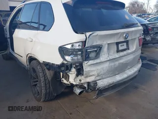 2012 BMW X5 35d with VIN 5UXZW0C56CL665631, listed as a IAAI auction lot 41055705 with 179,408 mi miles and . Bid and sale history available at DreamBid. Image 6.