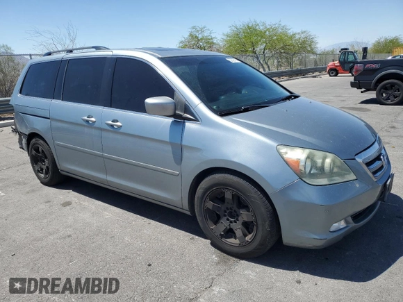 2005 Honda Odyssey Touring z VIN 5FNRL38805B131416, wystawiony jako Copart lot #59157395 z przebiegiem 263 087 mil mil oraz Szkoda całkowita • Salvage title. Historia ofert i sprzedaży dostępna na DreamBid. Obrazek 4.