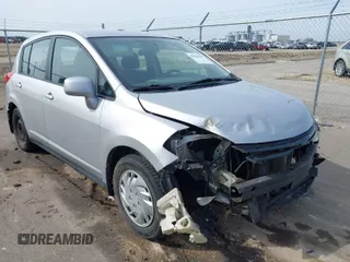 2009 Nissan Versa 1.8 SL with VIN 3N1BC13E49L388740, listed as a IAAI auction lot 41966343 with 125,780 mi miles. Bid and sale history available at carsss.com. Image 1.