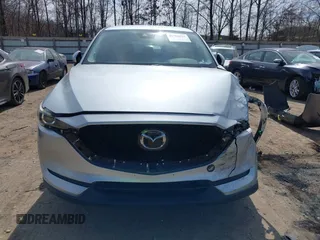 2020 Mazda CX-5 Touring with VIN JM3KFBCM3L0791816, listed as a IAAI auction lot 41761623 with 87,742 mi miles and . Bid and sale history available at carsss.com. Image 12.