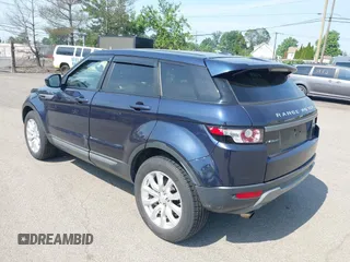 2015 Land Rover Range Rover Evoque Pure z VIN SALVN2BG5FH972645, wystawiony jako IAAI lot #42482661 z przebiegiem 156 726 mil mil oraz . Historia ofert i sprzedaży dostępna na DreamBid. Obrazek 3.