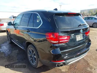 2016 BMW X5 xDrive35i with VIN 5UXKR0C54G0U11822, listed as a IAAI auction lot 41909821 with 149,460 mi miles. Bid and sale history available at carsss.com. Image 3.