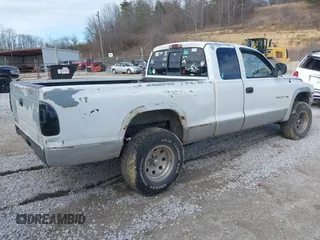 1997 Dodge Dakota with VIN 1B7GG23X0VS136400, listed as a IAAI auction lot 41642514 with 223,696 mi miles. Bid and sale history available at carsss.com. Image 4.