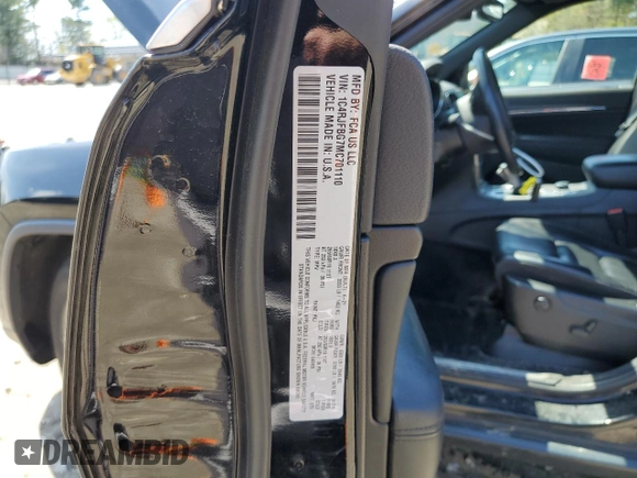 2021 Jeep Grand Cherokee Limited z VIN 1C4RJFBG7MC701110, wystawiony jako Copart lot #53803025 z przebiegiem 92 190 mil mil oraz Szkoda całkowita • Salvage title. Historia ofert i sprzedaży dostępna na DreamBid. Obrazek 13.