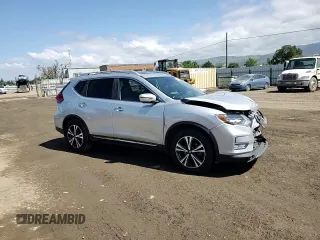 2017 Nissan Rogue SL z VIN 5N1AT2MT3HC885683, wystawiony jako Copart lot #54957275 z przebiegiem 127 879 mil mil oraz Szkoda całkowita • Salvage title. Historia ofert i sprzedaży dostępna na DreamBid. Obrazek 14.