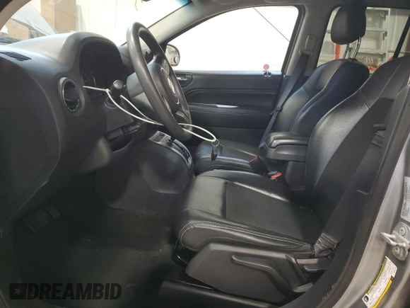 2016 Jeep Compass High Altitude with VIN 1C4NJDAB6GD753142, listed as a Copart auction lot 76963344 with 122,367 mi miles and Salvage Title. Bid and sale history available at carsss.com. Image 7.