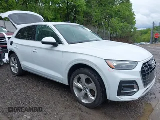 2021 Audi Q5 Premium Plus z VIN WA1BAAFY5M2063446, wystawiony jako IAAI lot #42301125 z przebiegiem 34 121 mil mil oraz . Historia ofert i sprzedaży dostępna na DreamBid. Obrazek 1.