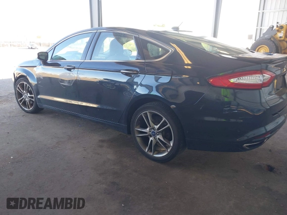 2014 Ford Fusion Titanium with VIN 3FA6P0K97ER328482, listed as a IAAI auction lot 40252350 with 137,128 mi miles. Bid and sale history available at carsss.com. Image 3.