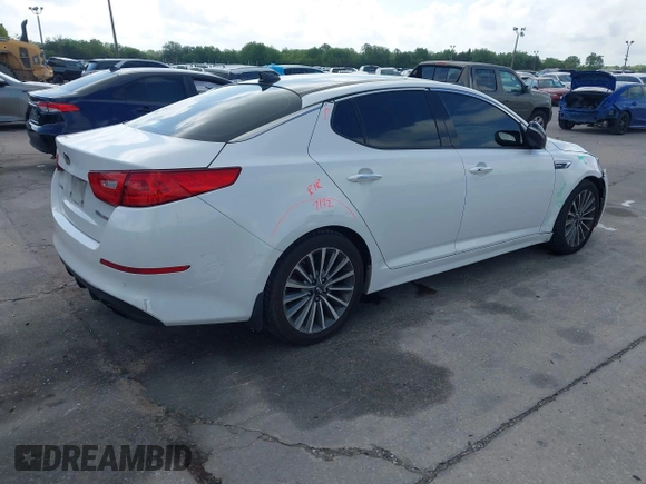 2015 Kia Optima SX Turbo with VIN 5XXGR4A60FG503940, listed as a IAAI auction lot 41944773 with 214,914 mi miles. Bid and sale history available at carsss.com. Image 4.