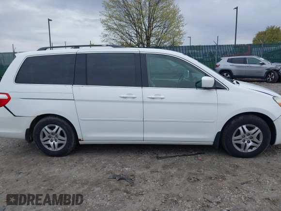 2006 Honda Odyssey EX with VIN 5FNRL384X6B433665, listed as a IAAI auction lot 42027622 with 215,990 mi miles and . Bid and sale history available at DreamBid. Image 12.