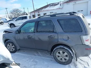 2009 Mercury Mariner with VIN 4M2CU91GX9KJ08073, listed as a IAAI auction lot 41404100 with 90,466 mi miles. Bid and sale history available at carsss.com. Image 14.