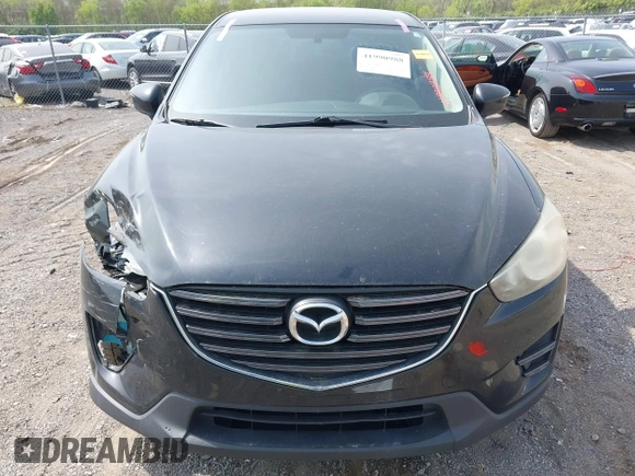 2016 Mazda CX-5 Sport with VIN JM3KE4BY8G0746377, listed as a IAAI auction lot 41990988 with 144,558 mi miles and . Bid and sale history available at carsss.com. Image 12.