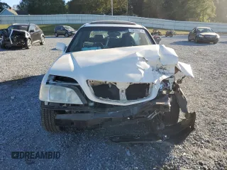 1999 Acura RL with VIN JH4KA9657XC008942, listed as a Copart auction lot 75336774 with 0 mi miles and Salvage Title. Bid and sale history available at carsss.com. Image 5.