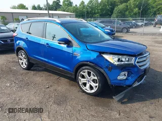 2019 Ford Escape Titanium with VIN 1FMCU9J97KUB83990, listed as a IAAI auction lot 42472205 with 83,291 mi miles and . Bid and sale history available at DreamBid. Image 1.