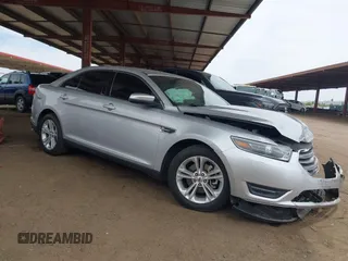 2015 Ford Taurus SEL z VIN 1FAHP2E89FG135539, wystawiony jako IAAI lot #42245195 z przebiegiem 71 351 mil mil oraz . Historia ofert i sprzedaży dostępna na DreamBid. Obrazek 1.