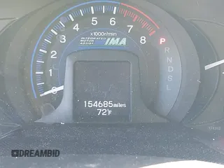 2012 Honda Insight LX with VIN JHMZE2H51CS003694, listed as a IAAI auction lot 41781384 with 154,685 mi miles and . Bid and sale history available at DreamBid. Image 15.