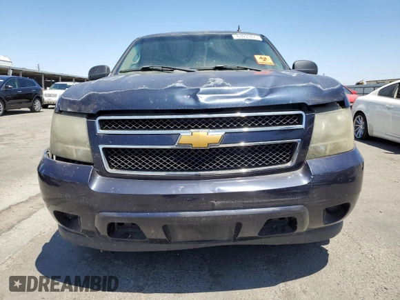 2007 Chevrolet Suburban LS z VIN 1GNFC160X7J180517, wystawiony jako Copart lot #63933475 z przebiegiem Nie podano mil oraz Czysty tytuł • Clean title. Historia ofert i sprzedaży dostępna na DreamBid. Obrazek 5.