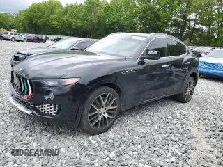 2017 Maserati Levante S with VIN ZN661YUS0HX243195, listed as a Copart auction lot 58905295 with 104,182 mi miles and Salvage title. Bid and sale history available at DreamBid. Image 1.