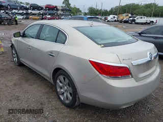 2011 Buick LaCrosse CXS with VIN 1G4GE5ED4BF301990, listed as a IAAI auction lot 41987714 with 144,554 mi miles and . Bid and sale history available at DreamBid. Image 3.