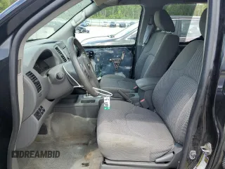 2018 Nissan Frontier SV with VIN 1N6AD0EV5JN745860, listed as a Copart auction lot 61404925 with 63,110 mi miles and Salvage title. Bid and sale history available at DreamBid. Image 7.