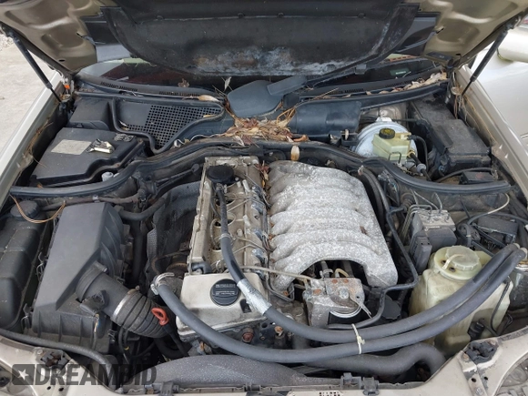 1998 Mercedes-Benz E 320 with VIN WDBJF25F5WA581878, listed as a IAAI auction lot 41662418 with 154,886 mi miles and . Bid and sale history available at DreamBid. Image 10.