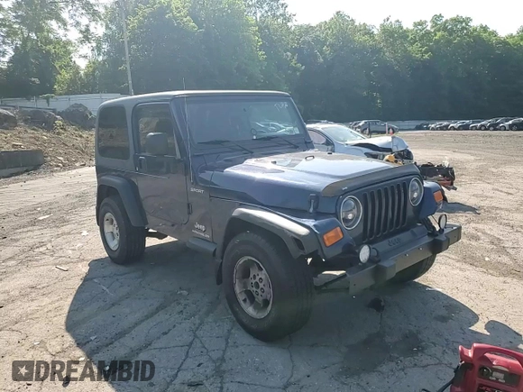 2003 Jeep Wrangler Sport z VIN 1J4FA49S13P347815, wystawiony jako Copart lot #59536685 z przebiegiem 74 298 mil mil oraz Szkoda całkowita • Salvage title. Historia ofert i sprzedaży dostępna na DreamBid. Obrazek 14.