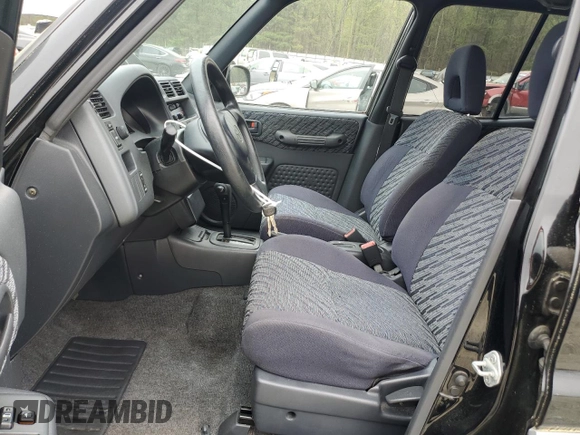 1998 Toyota RAV4 with VIN JT3GP10V7W0028970, listed as a Copart auction lot 51585215 with Not provided miles and Clean title. Bid and sale history available at DreamBid. Image 7.