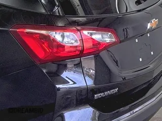 2019 Chevrolet Equinox LT z VIN 2GNAXTEV2K6259533, wystawiony jako IAAI lot #42556128 z przebiegiem 91 907 mil mil oraz . Historia ofert i sprzedaży dostępna na DreamBid. Obrazek 20.