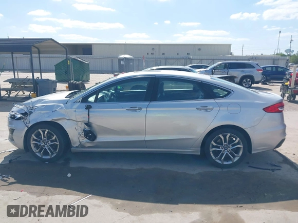 2019 Ford Fusion SEL with VIN 3FA6P0CD2KR116863, listed as a IAAI auction lot 42011256 with 72,676 mi miles. Bid and sale history available at carsss.com. Image 14.