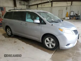 2013 Toyota Sienna LE AAS with VIN 5TDKK3DC5DS290764, listed as a Copart auction lot 60247735 with 143,014 mi miles and Clean title. Bid and sale history available at DreamBid. Image 4.