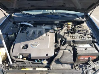 2003 Nissan Maxima SE z VIN JN1DA31D03T516575, wystawiony jako IAAI lot #42153623 z przebiegiem 176 446 mil mil oraz . Historia ofert i sprzedaży dostępna na DreamBid. Obrazek 10.