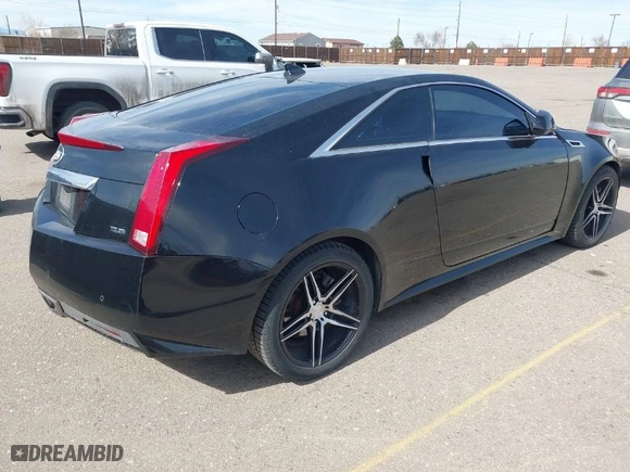 2012 Cadillac CTS Coupe with VIN 1G6DC1E33C0158695, listed as a IAAI auction lot 41752295 with 150,887 mi miles. Bid and sale history available at carsss.com. Image 4.