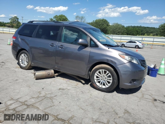 2012 Toyota Sienna XLE AAS with VIN 5TDYK3DC4CS197176, listed as a Copart auction lot 57942845 with Not provided miles and Salvage title. Bid and sale history available at DreamBid. Image 4.