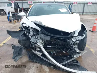 2023 Tesla Model 3 Performance z VIN 5YJ3E1EC8PF487550, wystawiony jako IAAI lot #42093712 z przebiegiem 27 305 mil mil oraz . Historia ofert i sprzedaży dostępna na DreamBid. Obrazek 12.