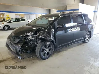 2014 Toyota Sienna SE with VIN 5TDXK3DC5ES418508, listed as a Copart auction lot 69742974 with 210,168 mi miles and Salvage Title. Bid and sale history available at carsss.com. Image 1.