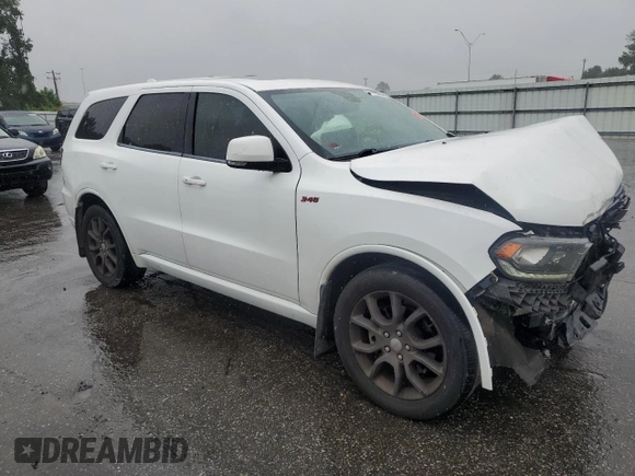 2017 Dodge Durango R/T with VIN 1C4SDHCT1HC609691, listed as a Copart auction lot 59433395 with 124,502 mi miles and Salvage title. Bid and sale history available at DreamBid. Image 4.