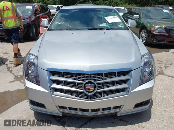 2013 Cadillac CTS Luxury with VIN 1G6DE5E56D0179190, listed as a IAAI auction lot 42726459 with 145,393 mi miles and . Bid and sale history available at DreamBid. Image 6.