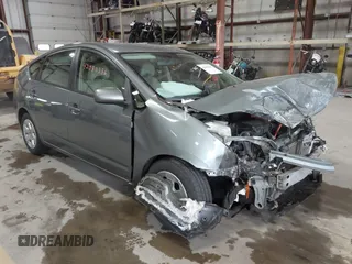 2005 Toyota Prius with VIN JTDKB20U453123405, listed as a IAAI auction lot 42080386 with 262,688 mi miles and . Bid and sale history available at DreamBid. Image 1.