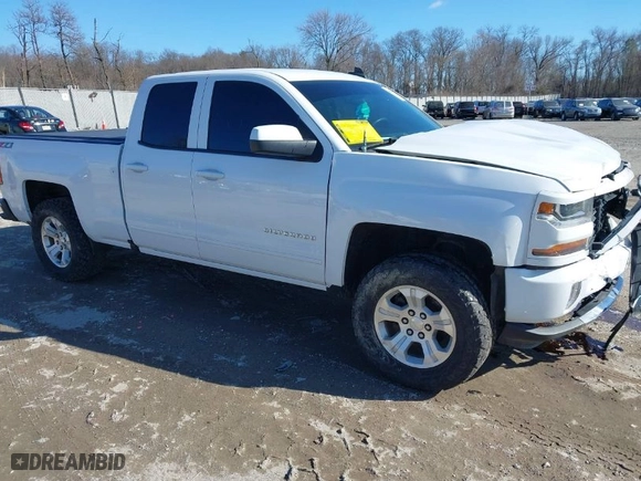 2018 Chevrolet Silverado 1500 LT with VIN 1GCVKREC5JZ350034, listed as a IAAI auction lot 41649277 with 112,673 mi miles. Bid and sale history available at carsss.com. Image 1.