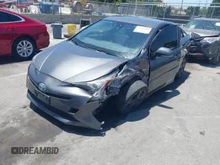 2017 Toyota Prius Two with VIN JTDKARFU1H3534154, listed as a IAAI auction lot 42531808 with 123,954 mi miles and . Bid and sale history available at DreamBid. Image 2.