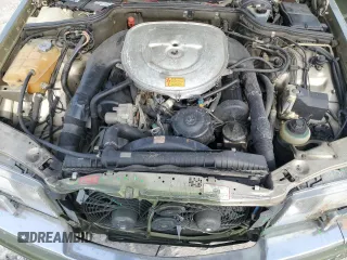 1990 Mercedes-Benz 560 z VIN WDBCA39E4LA548591, wystawiony jako Copart lot #70799134 z przebiegiem 146 323 mil mil oraz Szkoda całkowita • Salvage title. Historia ofert i sprzedaży dostępna na DreamBid. Obrazek 11.