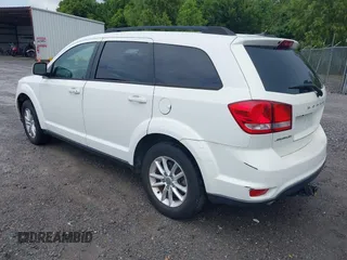 2015 Dodge Journey SXT z VIN 3C4PDCBG3FT561089, wystawiony jako IAAI lot #42634049 z przebiegiem 108 035 mil mil oraz . Historia ofert i sprzedaży dostępna na DreamBid. Obrazek 3.